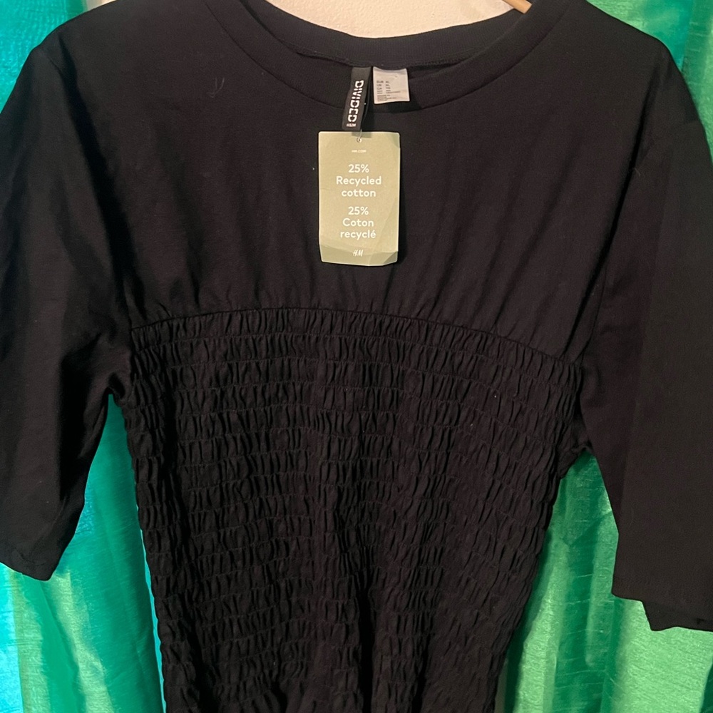 Divided Black Smocked Top